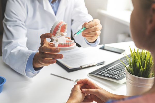 dentist consultation - patient visit at dental clinics office