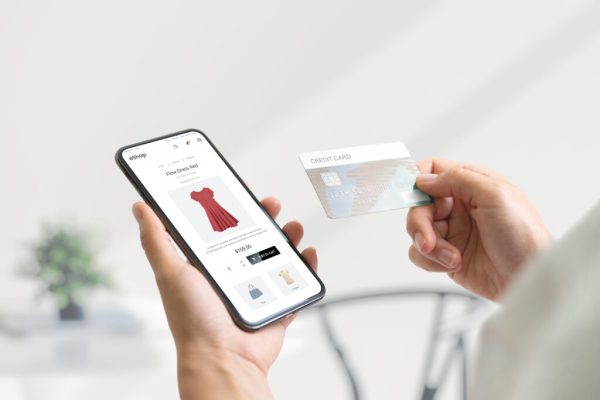 Shopping online with smart phone and credit card concept Modern